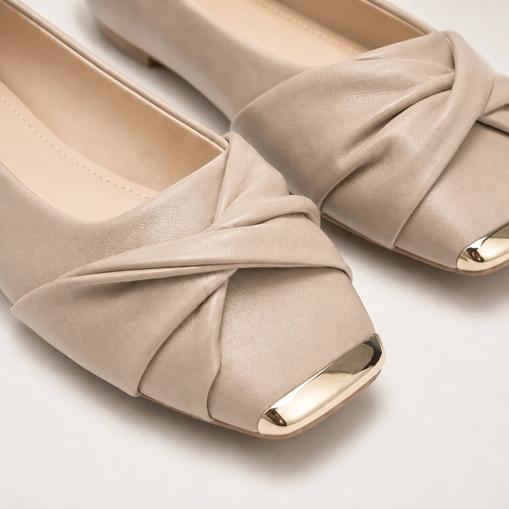 Close-up detail of the square toe flat shoe material and front construction