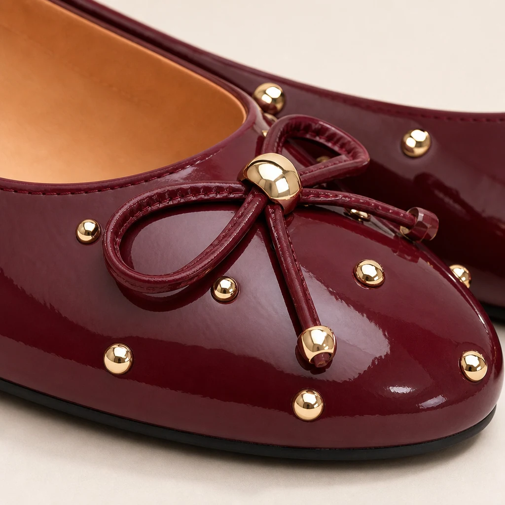 Close-up detail of the bow flats glossy finish and front bow