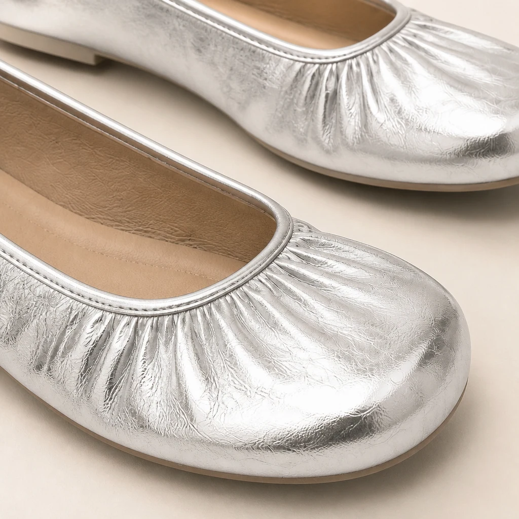 Close-up detail of the ruched ballet flats upper and soft construction