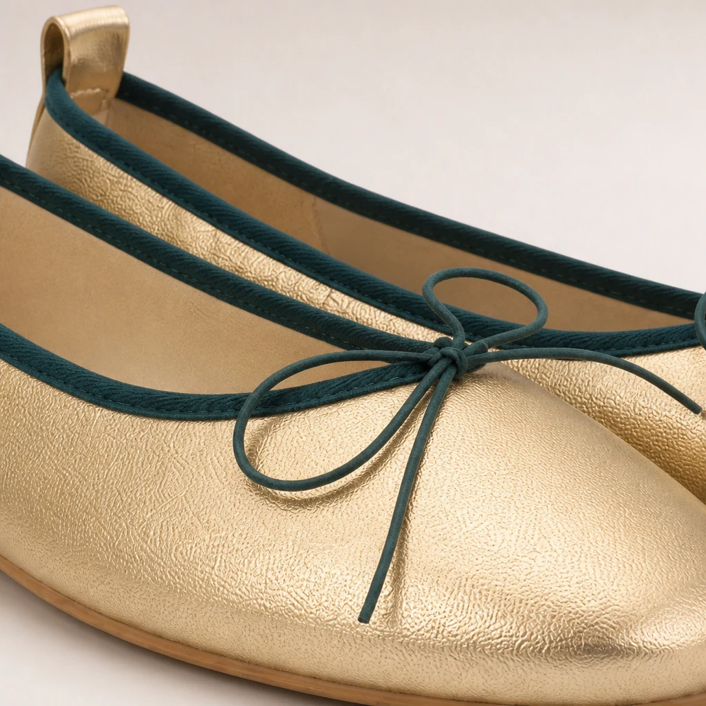 Close-up detail of the ballet flat material and bow construction